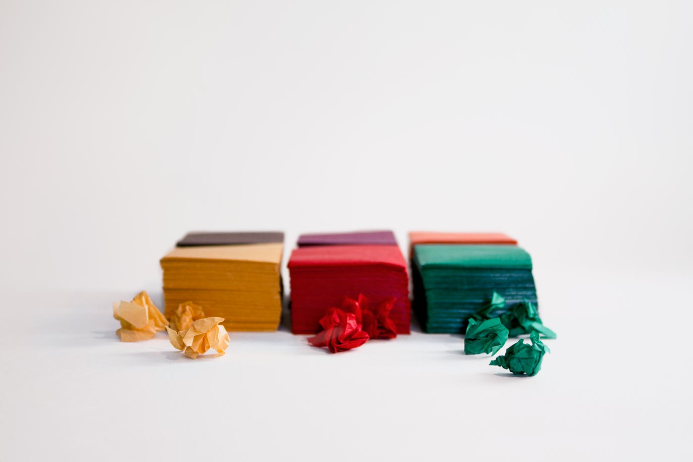 Stacks and crumpled up balls of tissue paper