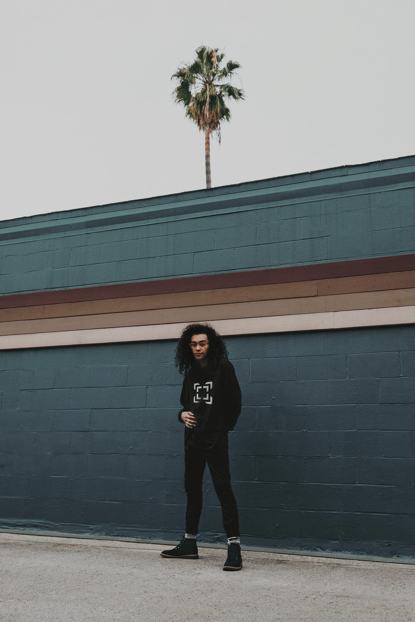 Man wearing a sweater with the new Launch logo